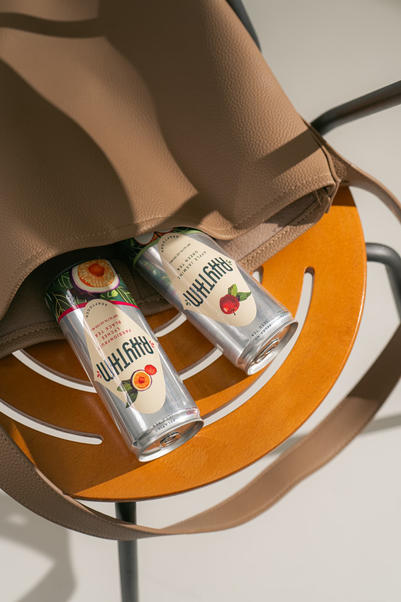 Rhythm iced tea cans shared during a relaxing moment